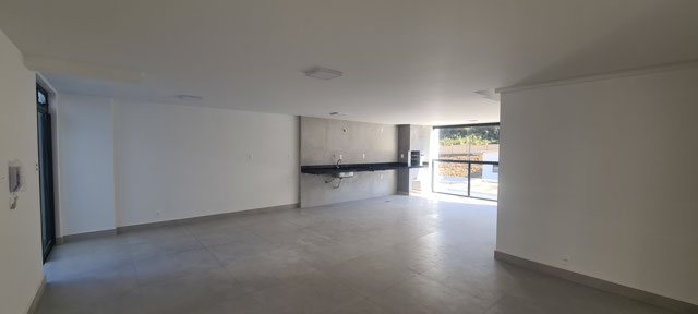 Sala com cozinha e varanda