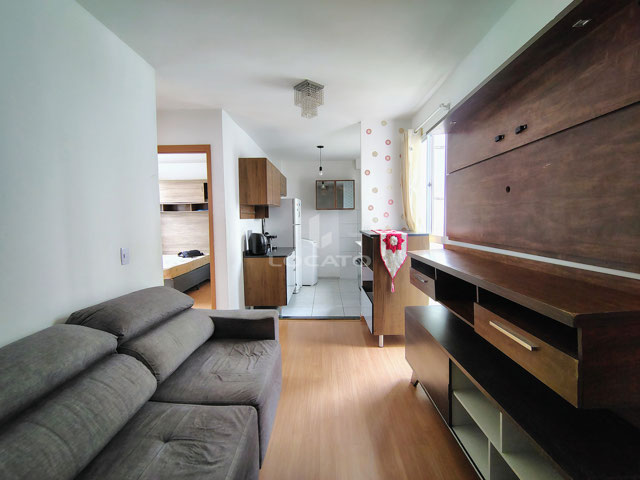 sala integrada a cozinha