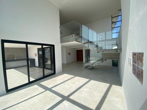 sala estar com pédireito suplo