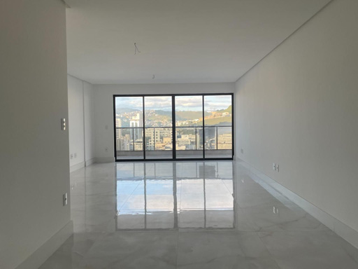 Sala com espaços generosos para 2 ambientes