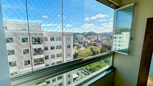 Varanda com cortina de vidro