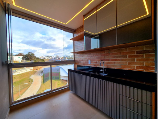 Varanda gourmet com cortina de vidro