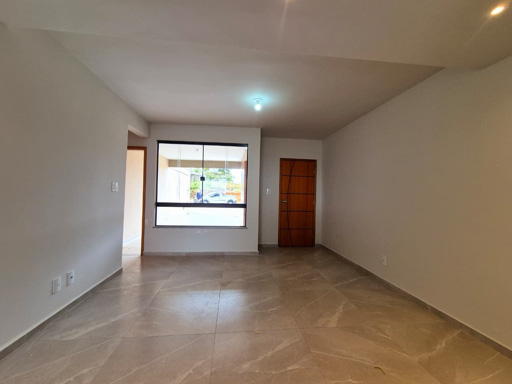 Sala ampla integrada a cozinha