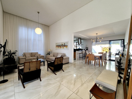 Sala de estar integrada a sala de jantar e cozinha