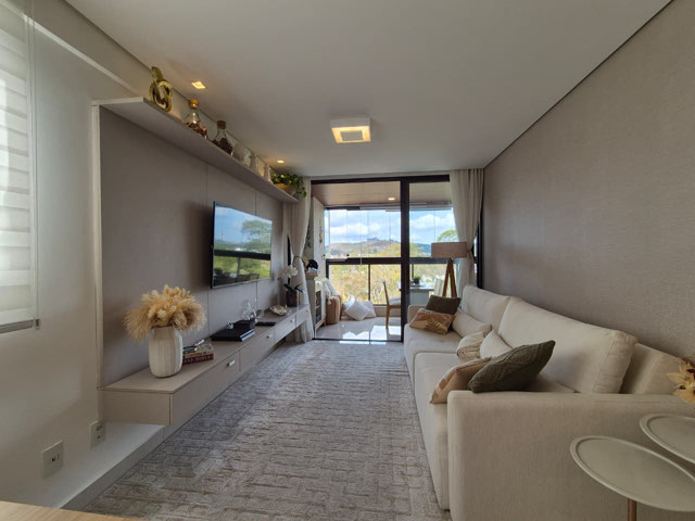 Sala de estar integrada a varanda gourmet