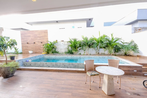 Casa 4 suítes a venda no condomínio fechado Portal do Sol Green em Goiânia. - Foto