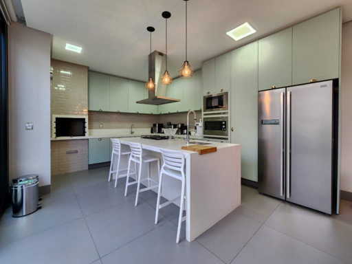 Casa térrea mobiliada e decorada à venda em condomínio fechado Portal do Sol Green em Goiânia-GO. - Foto