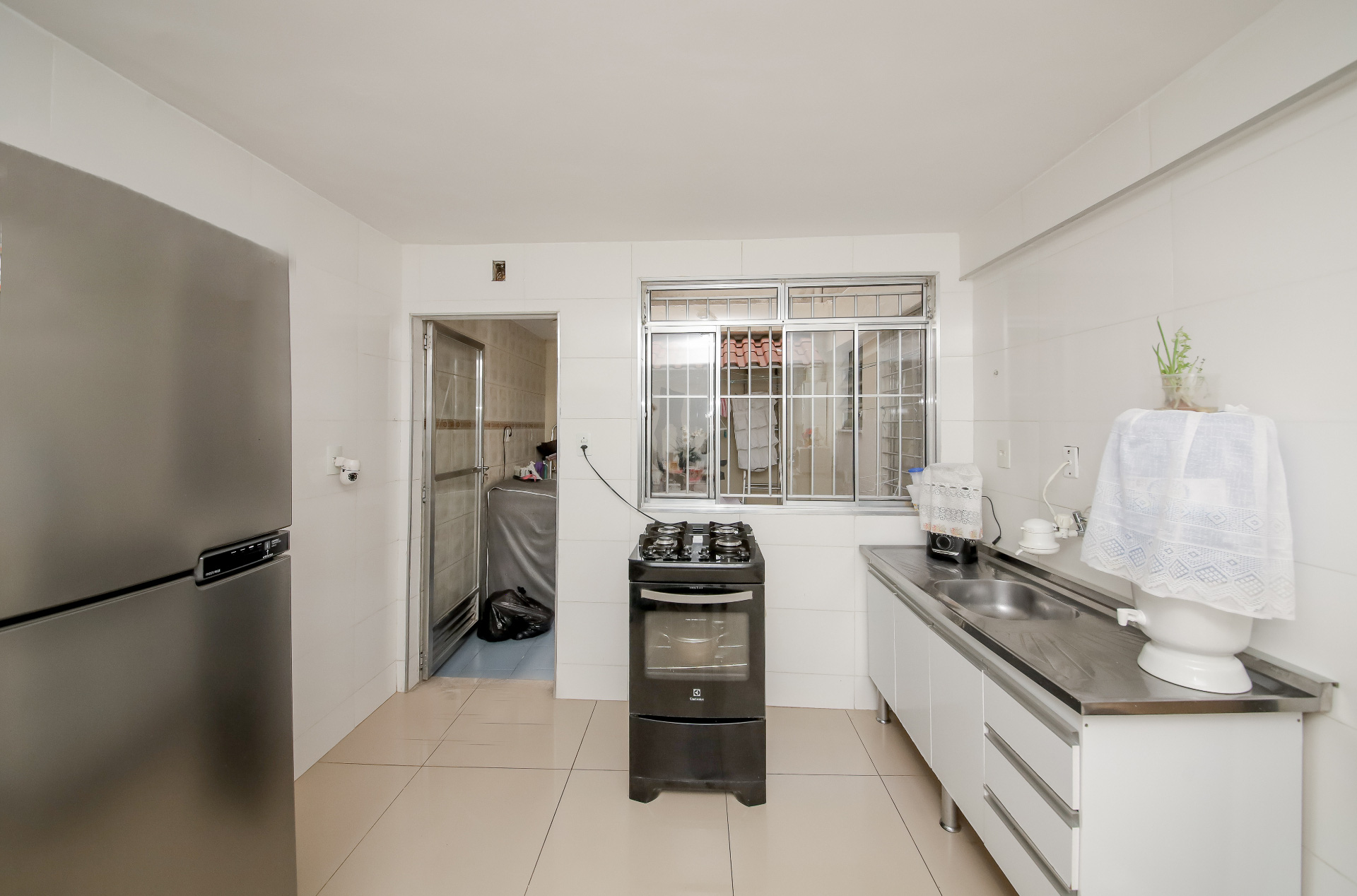 Jardim Glória: copa e cozinha reformadas, área externa., foto 15