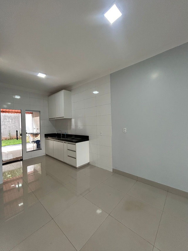 Cozinha integrada com a sala de TV